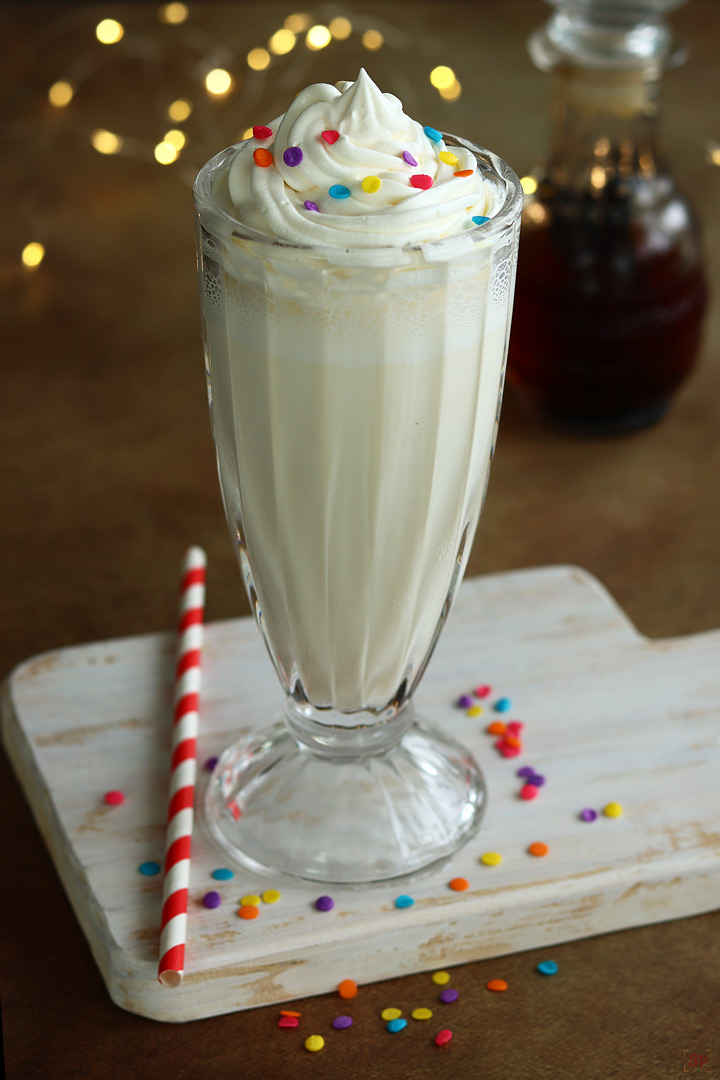 vanilla milkshake served in a tall glass