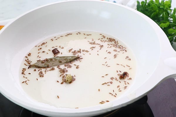 add whole spices, cumin seeds