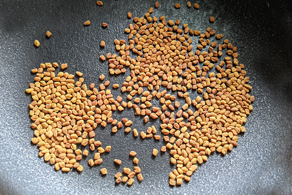 roast fenugreek seeds until golden