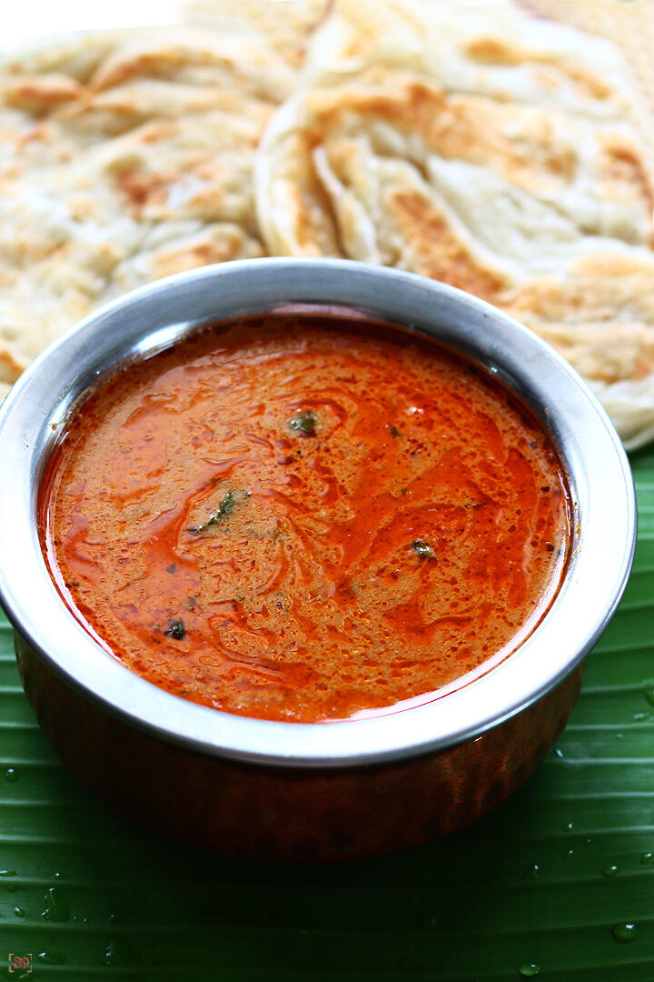 salna served in a bowl with parotta on the back