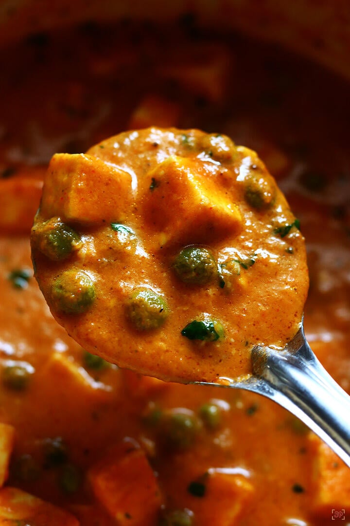 matar paneer in a serving ladle