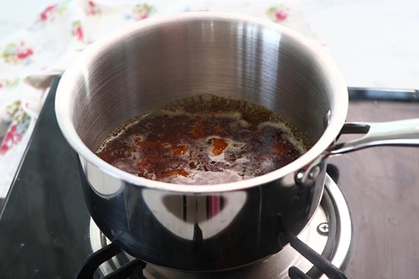 add jaggery, water