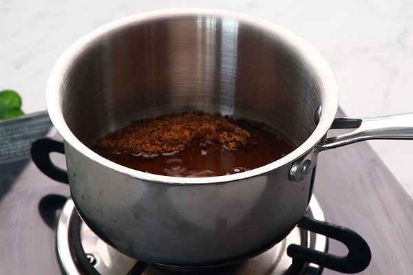 add jaggery, water