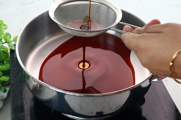 strain and add to pan