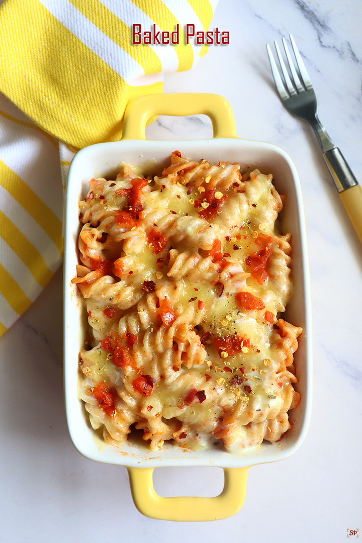 baked pasta in a yellow baking tray