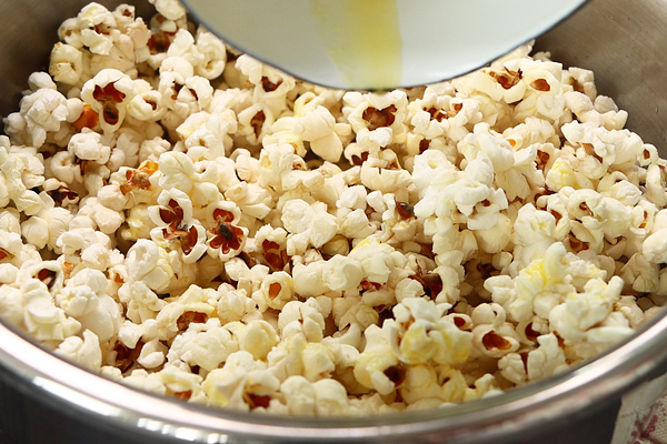 Cheese Popcorn Recipe - add melted butter mixture at the sides