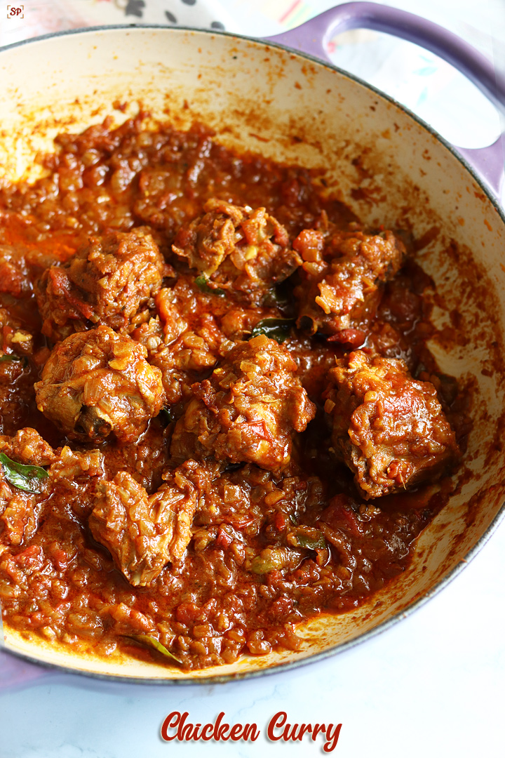 chicken curry cooked in a shallow casserole