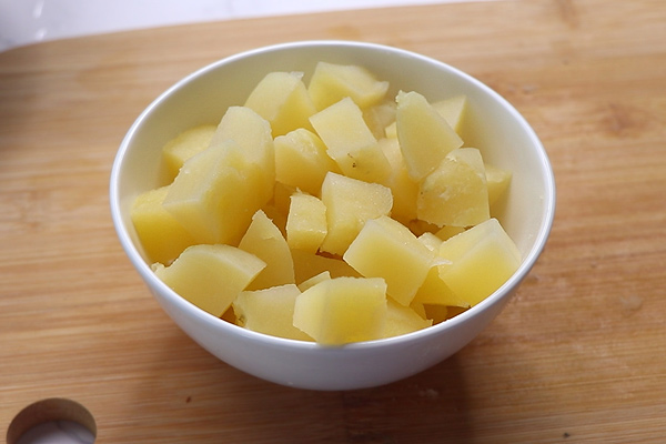 potatoes are cut into small cubes