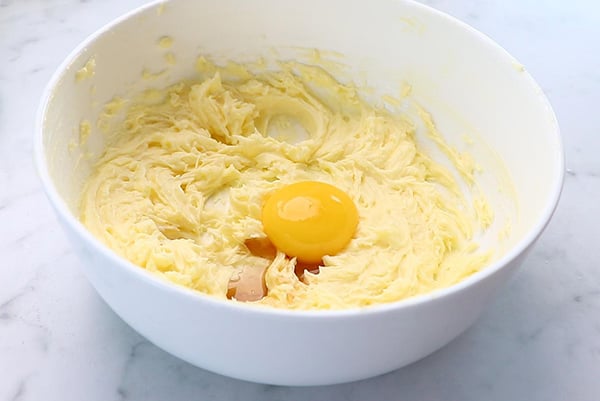 add egg yolk, vanilla extract