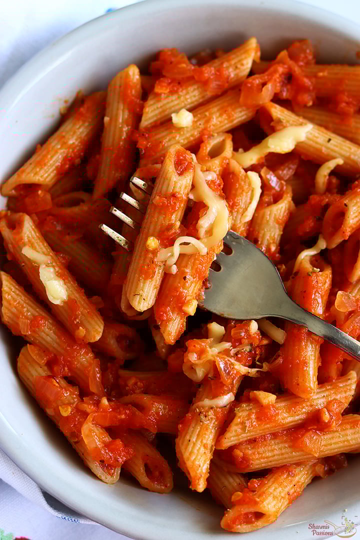 red sauce pasta served with cheese