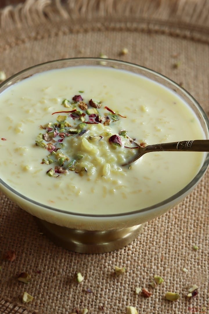 rice kheer with nuts and saffron garnish