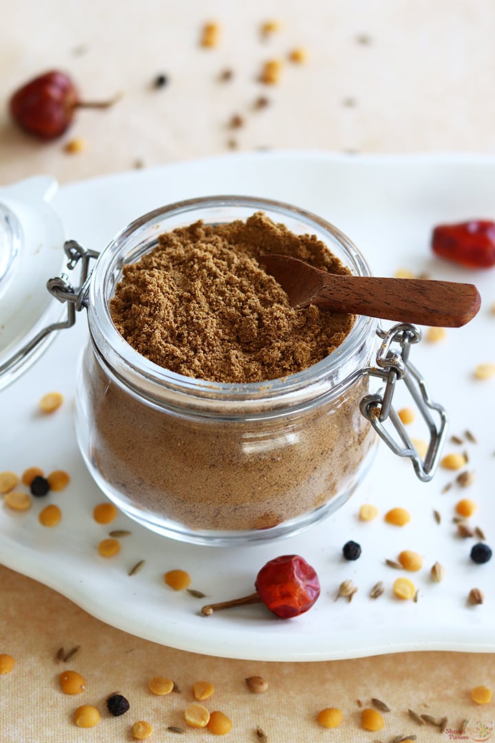 rasam powder stored in a glass jar