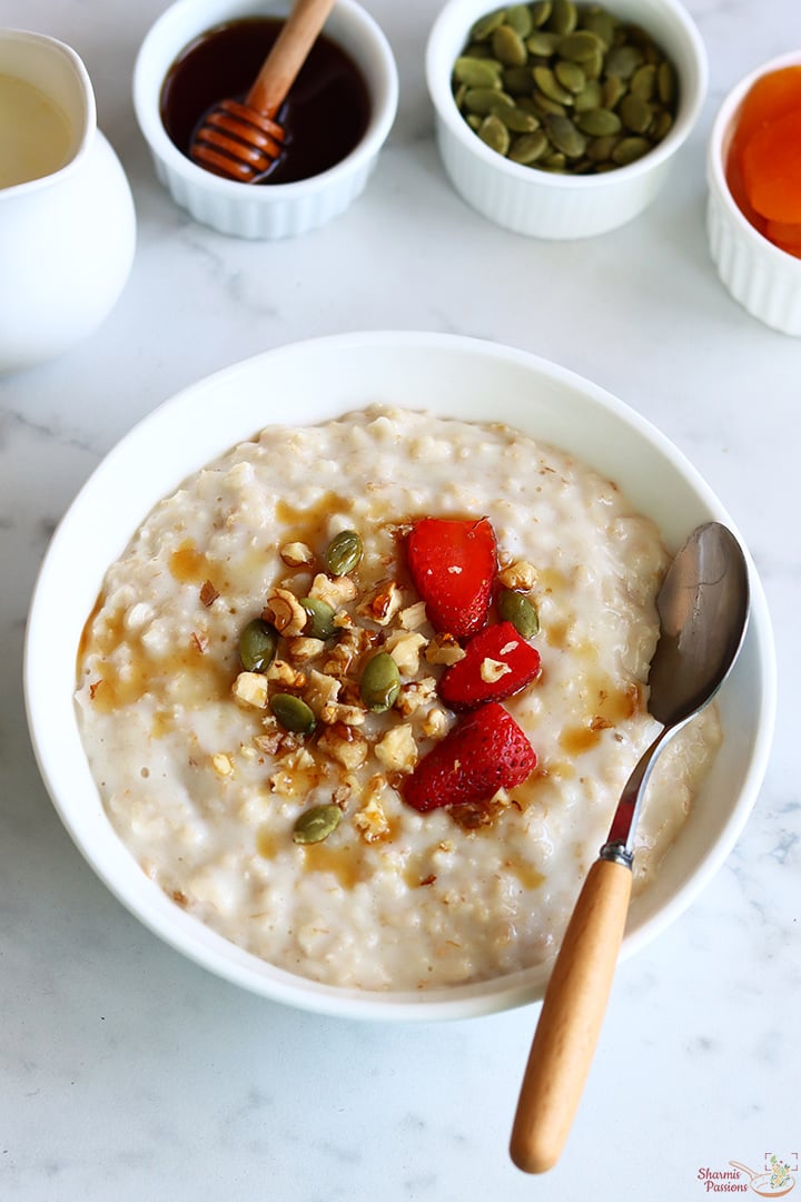 oatmeal porridge served with nuts and seeds