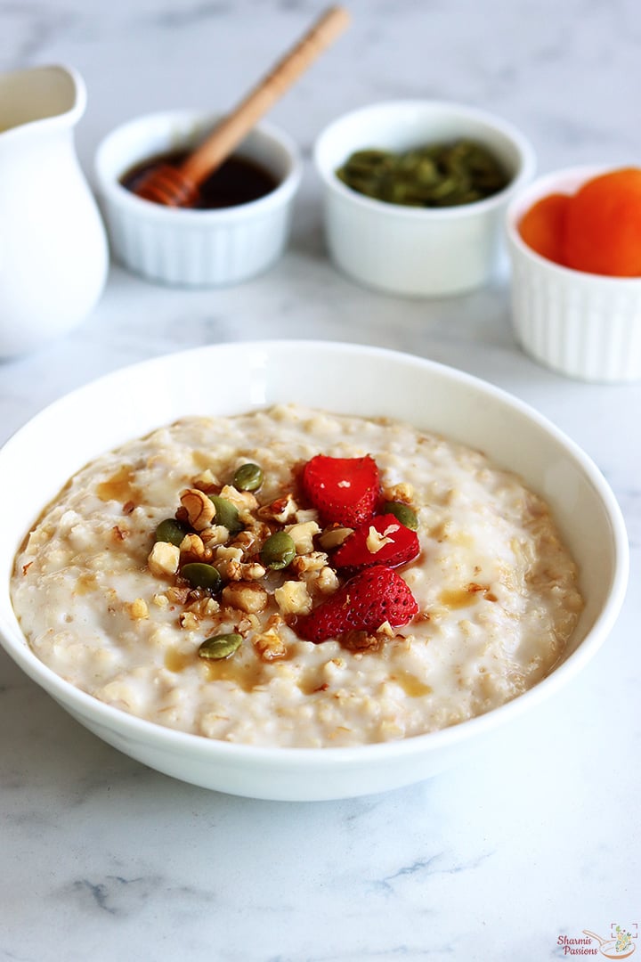 oatmeal porridge served with nuts and seeds