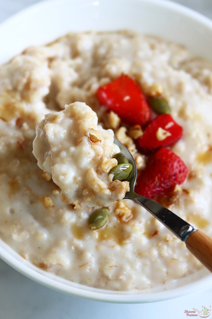 oatmeal porridge served with nuts and seeds