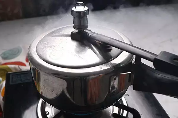 pressure cook for 4 whistles