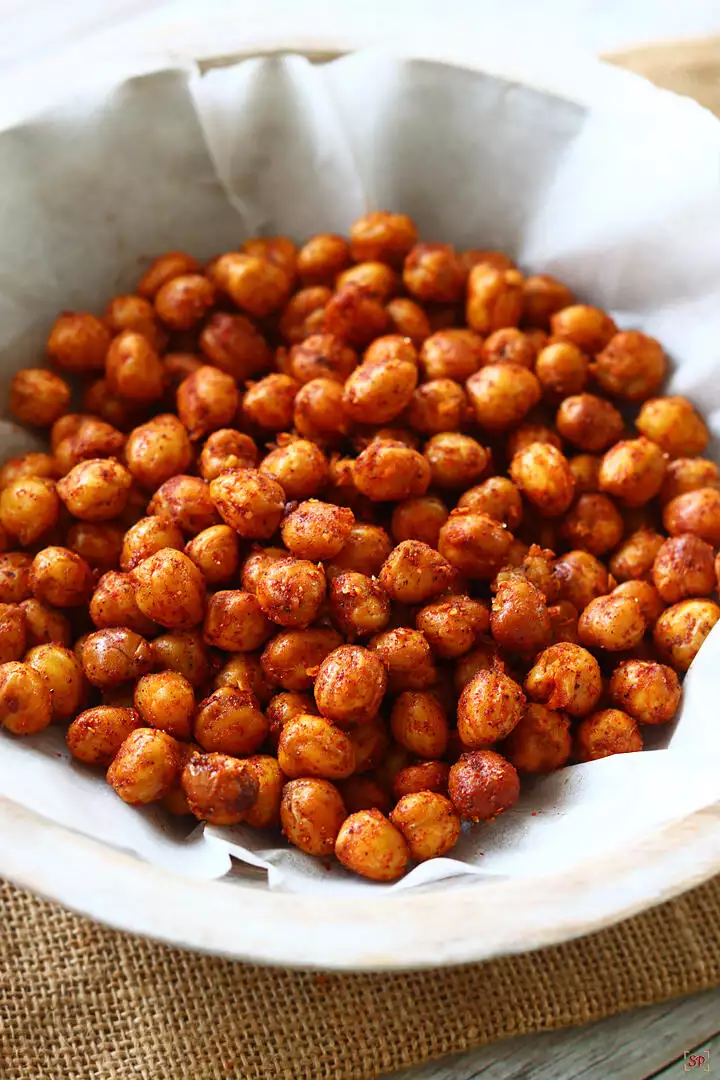 roasted chickpeas placed in a wooden bowl