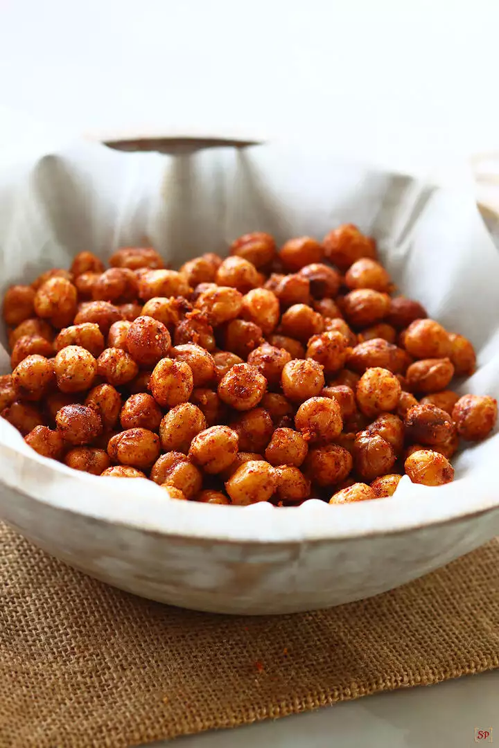 roasted chickpeas placed in a wooden bowl