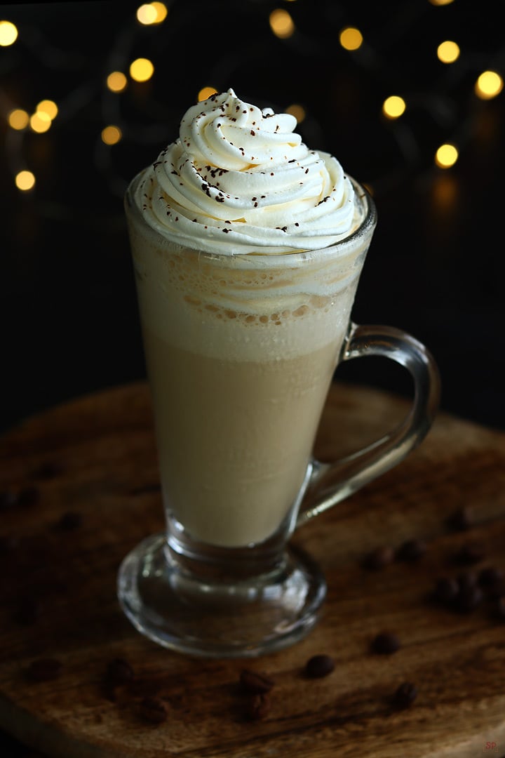 Cold coffee served with whipped cream topping
