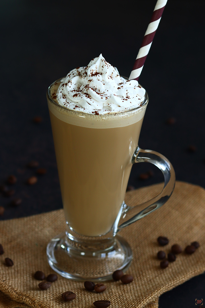 cold coffee served with whipped cream topping