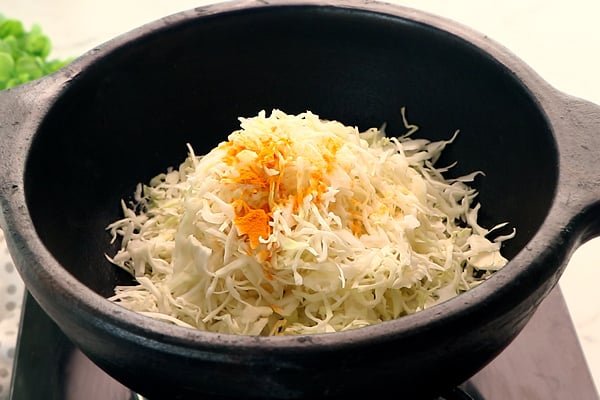 add cabbage, salt, turmeric powder