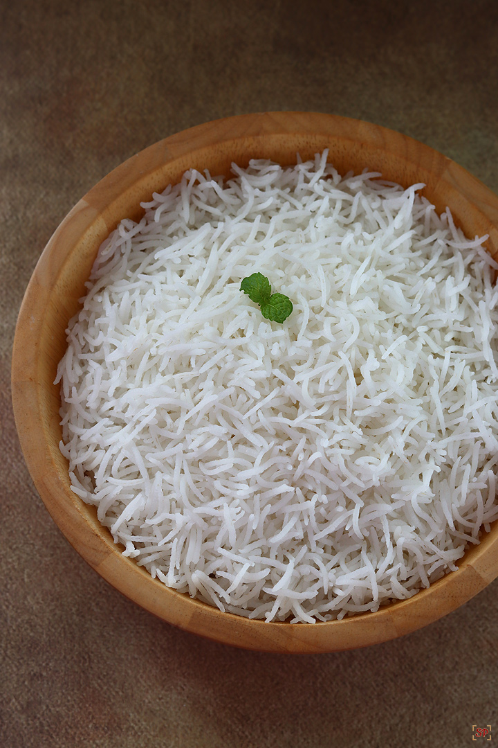 perfectly cooked basmati rice in a wooden bowl
