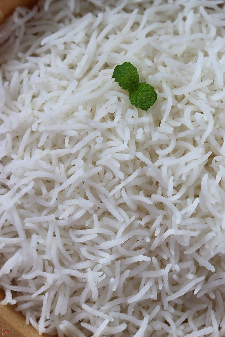 perfectly cooked basmati rice in a wooden bowl