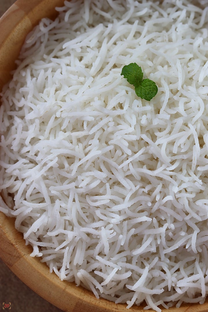 perfectly cooked basmati rice in a wooden bowl