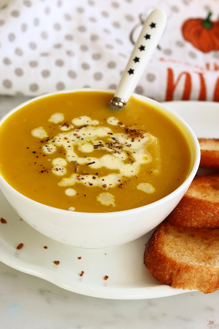 pumpkin soup served with bread