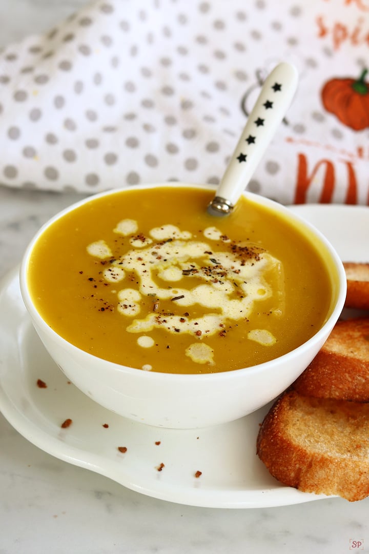 pumpkin soup served with bread