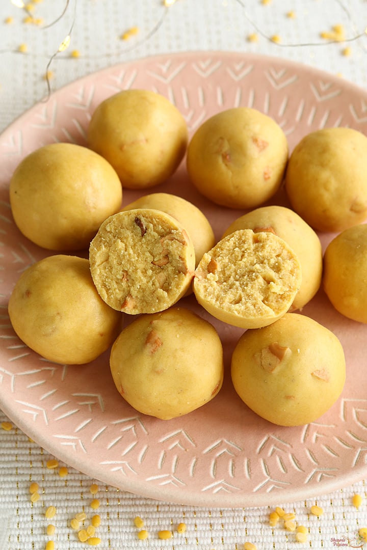 moong dal ladoo served in a pink plate