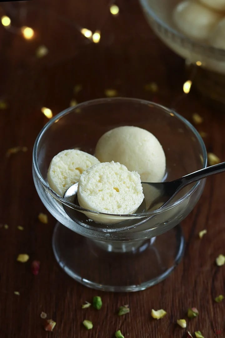 rasgulla served in a glass bowl
