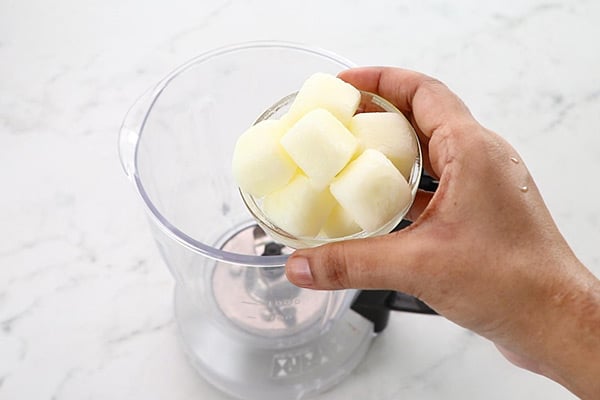 add frozen milk cubes