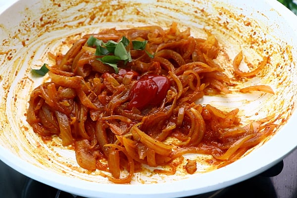 add tomato sauce, curry leaves