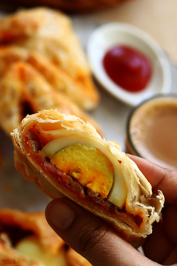egg puffs served with tomato sauce and tea
