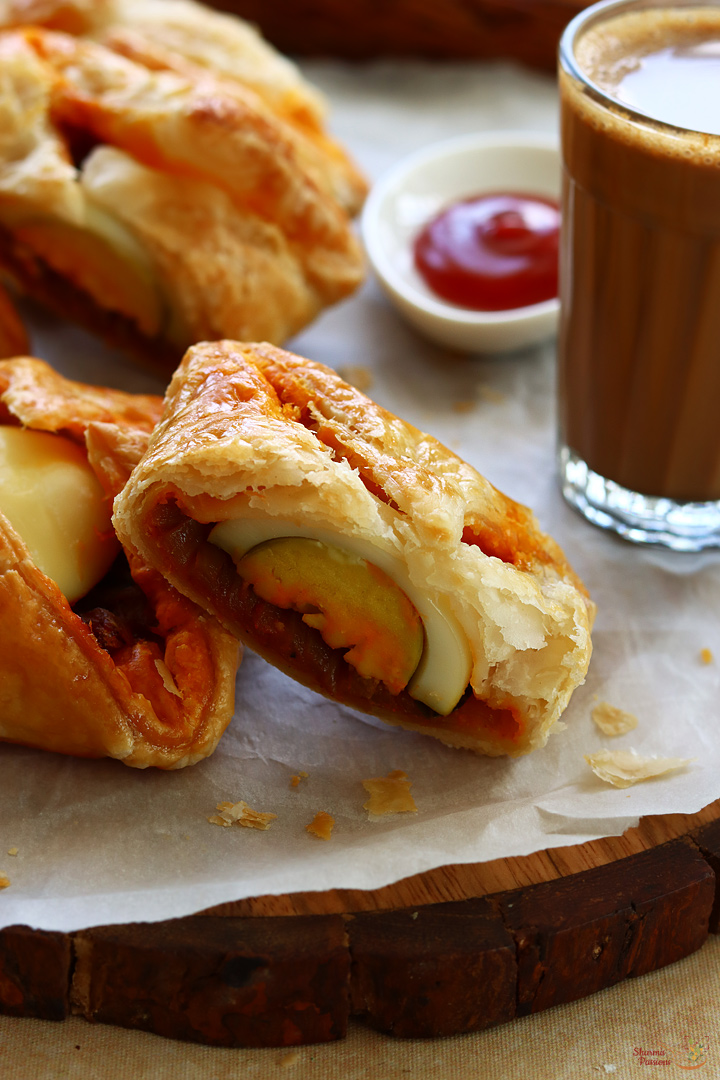 egg puffs served with tomato sauce and tea
