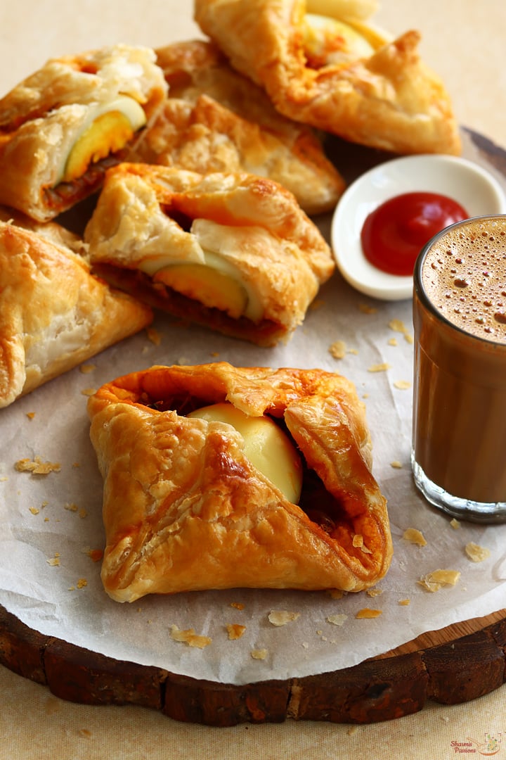 egg puffs served with tomato sauce and tea