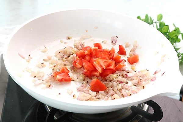 saute, add tomatoes
