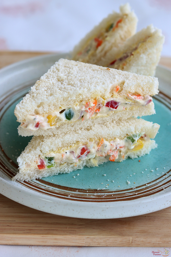 cream cheese sandwich served with a cup of coffee