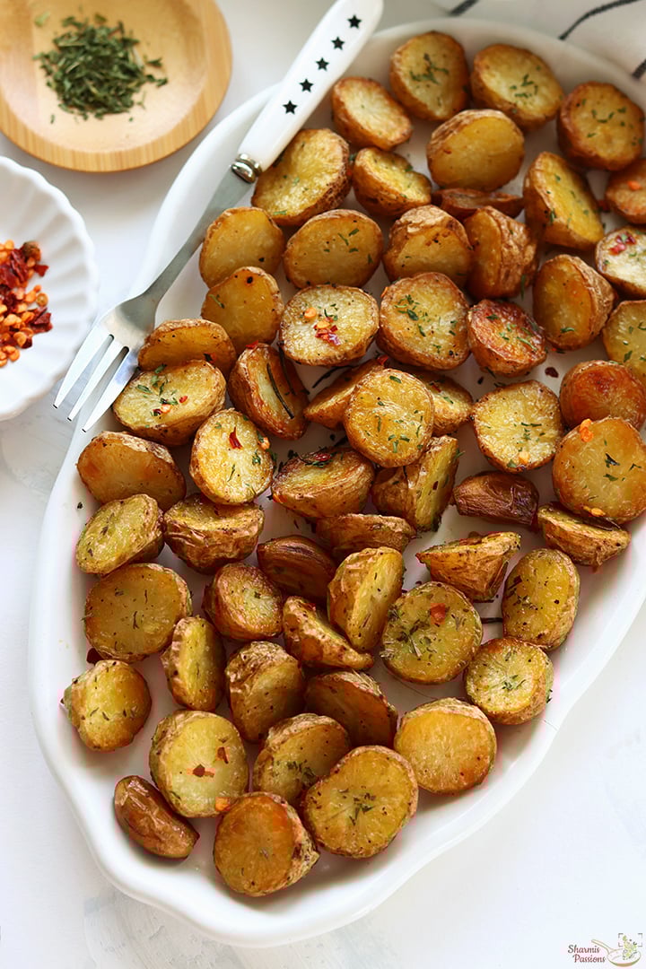 roast potatoes served in a white platter