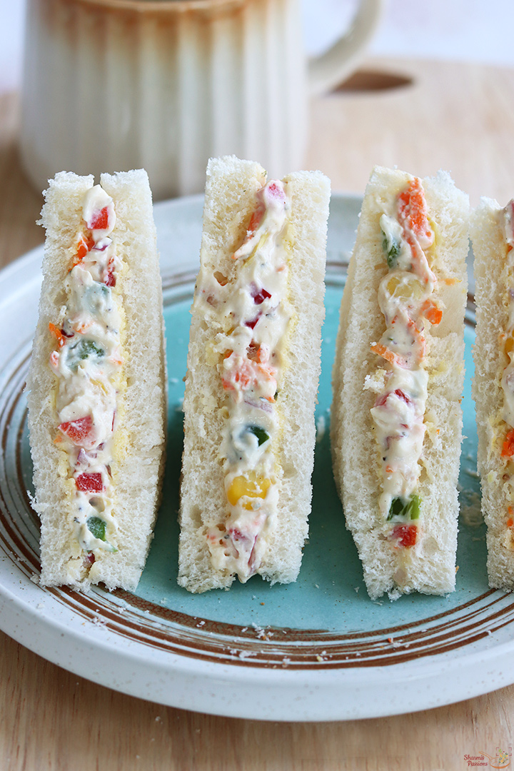 cream cheese sandwich served with a cup of coffee