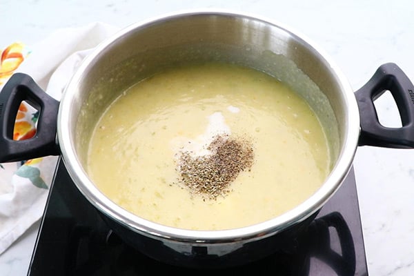 add milk, pepper powder, oregano