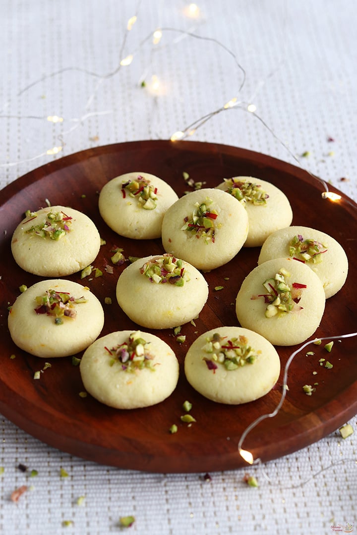 sandesh sweet served in a wooden plate