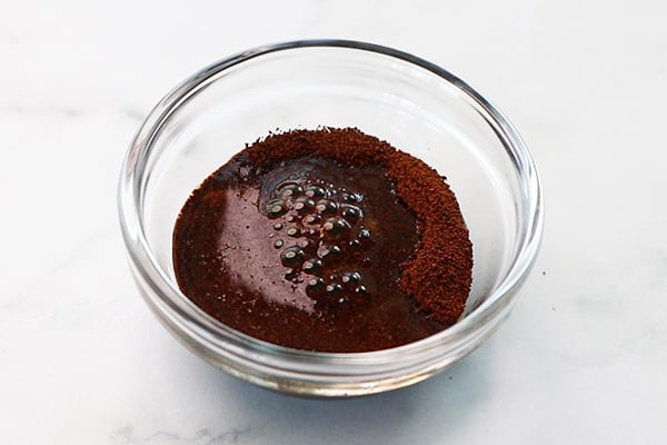 add coffee powder, warm water