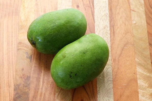 raw unripe mangoes