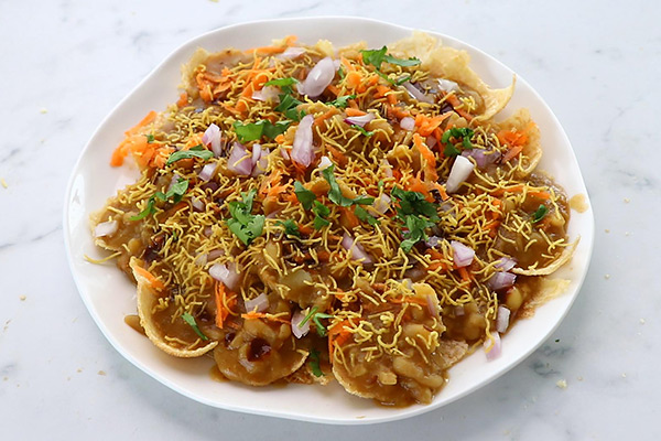 add sev, coriander leaves