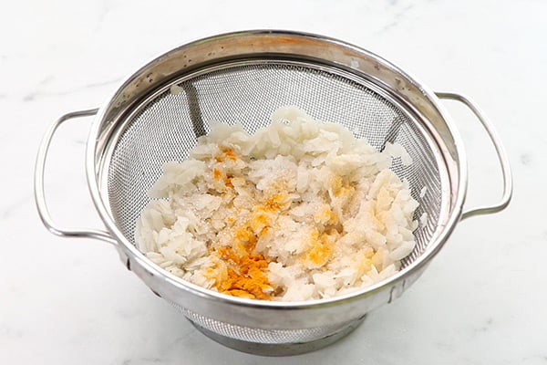 add salt, sugar and turmeric powder