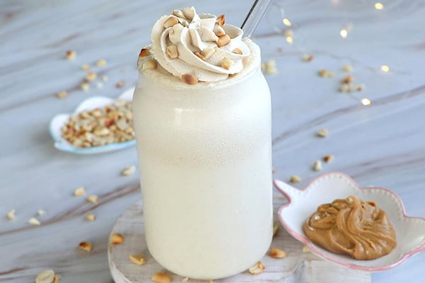 top with shipped cream, roasted peanuts