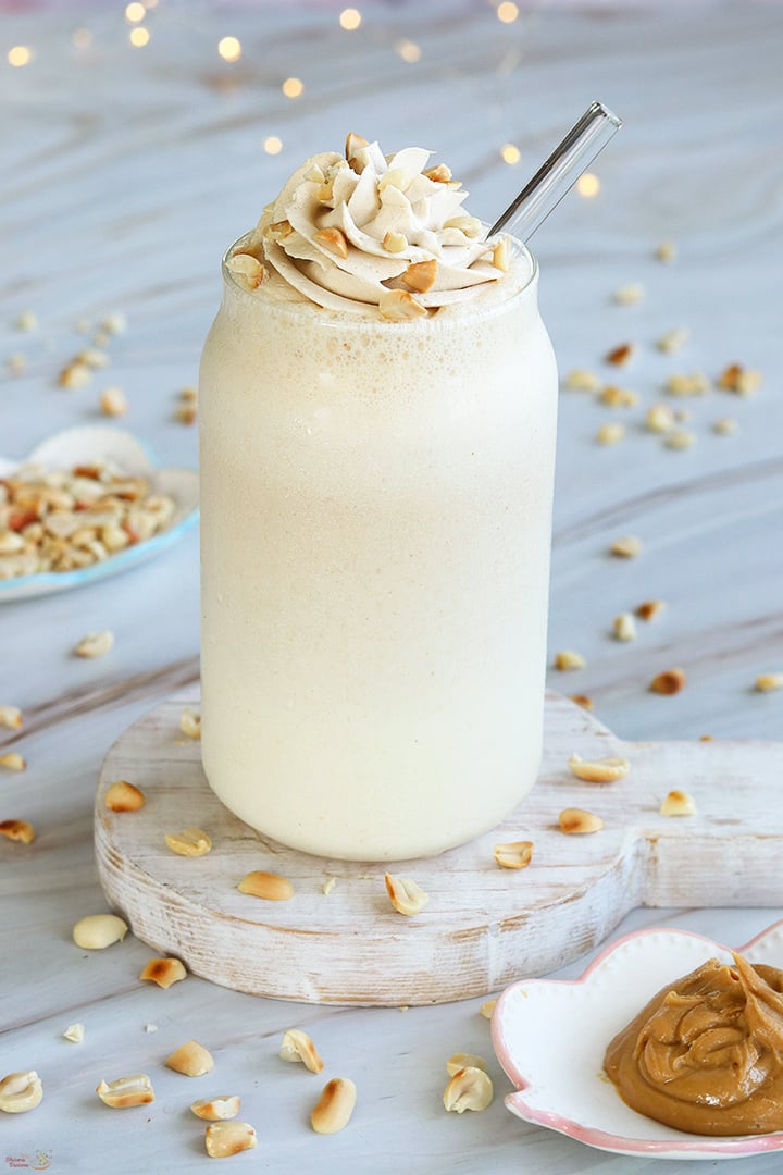 peanut butter milkshake served with whipped cream topping