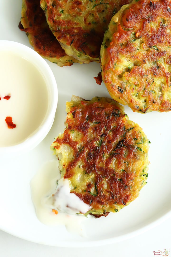 crispy zucchini fritters served with cheese spread